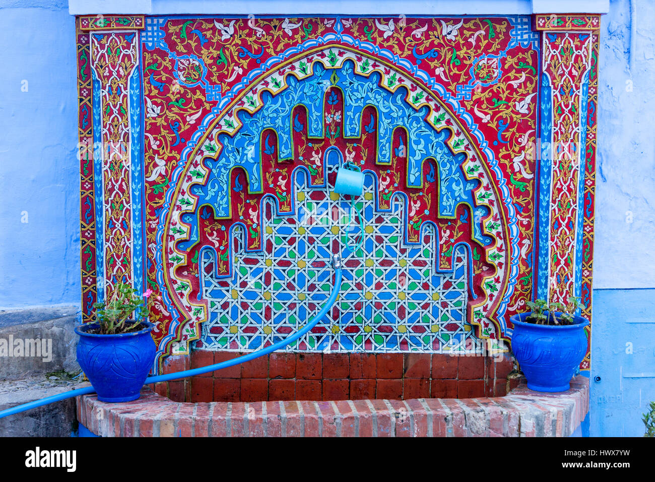 Chefchaouen, Morocco.  Public Drinking Fountain and water Tap. Stock Photo
