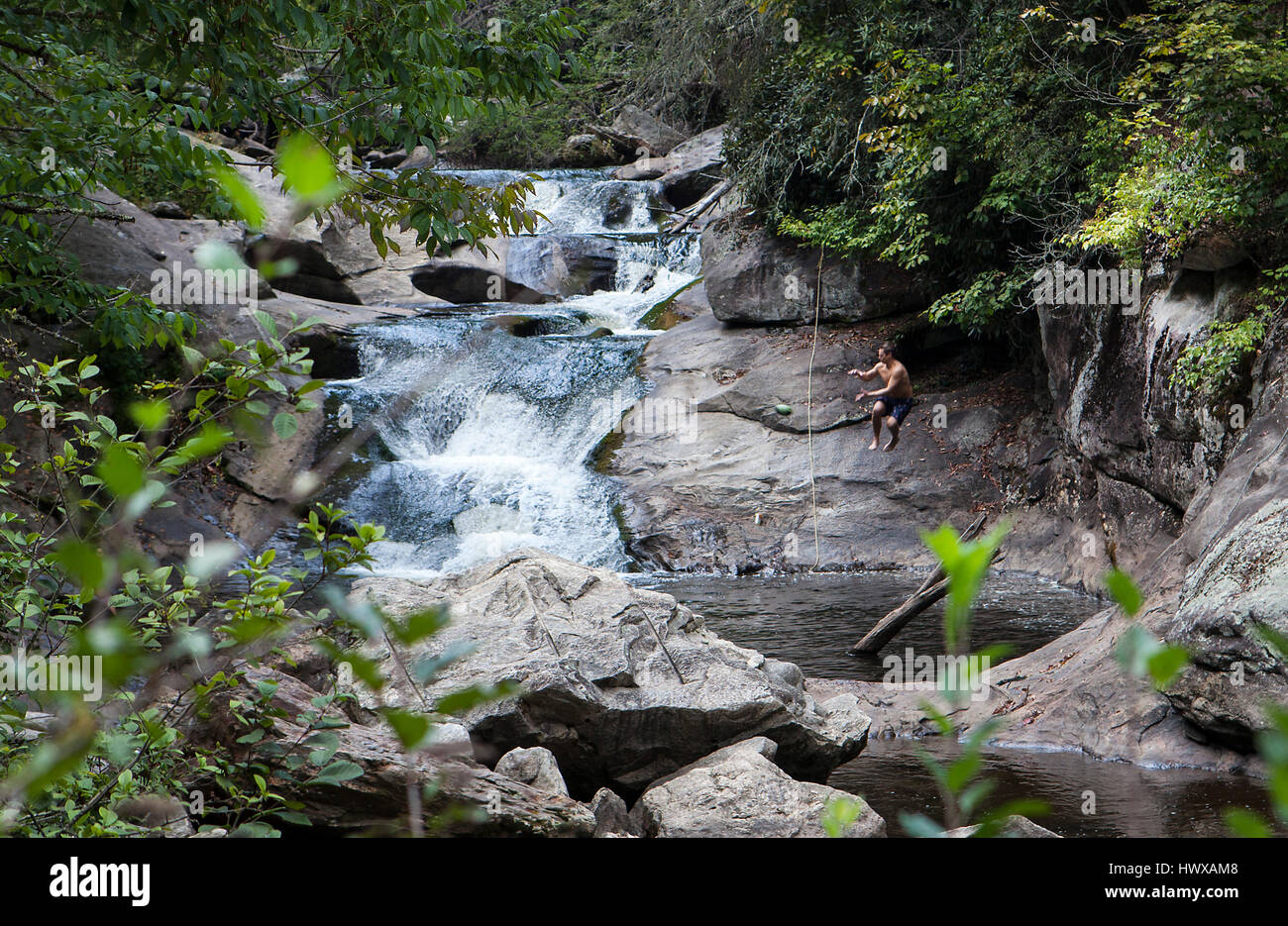 A popular swimming hole on the Cullasaja River Gorge in the Nantahala National Forest along US Highway 64 is also known as Quarry Falls. This section  Stock Photo