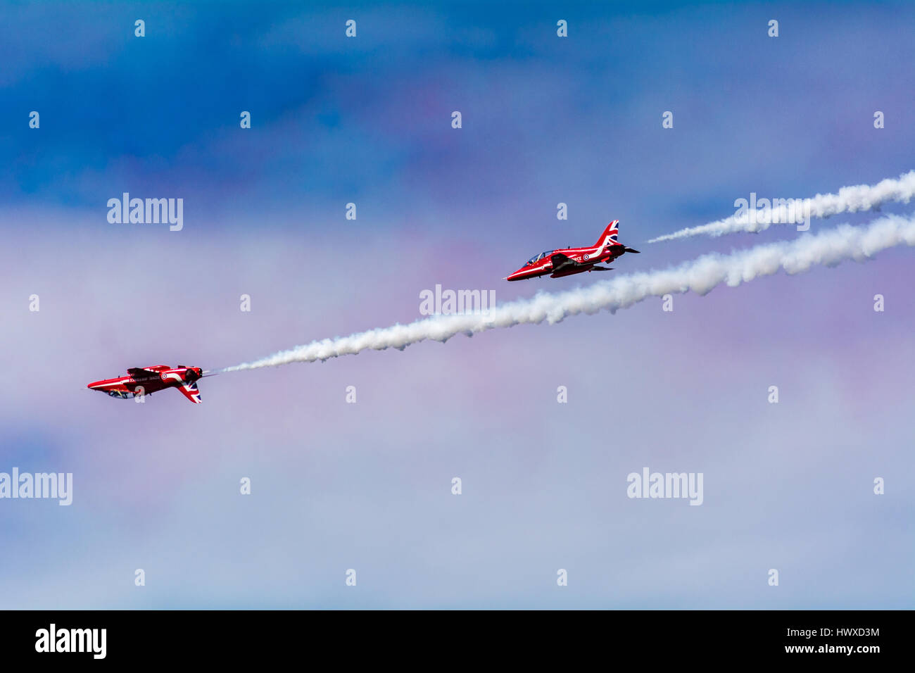 Red Arrows with coloured smoke in sky Stock Photo - Alamy