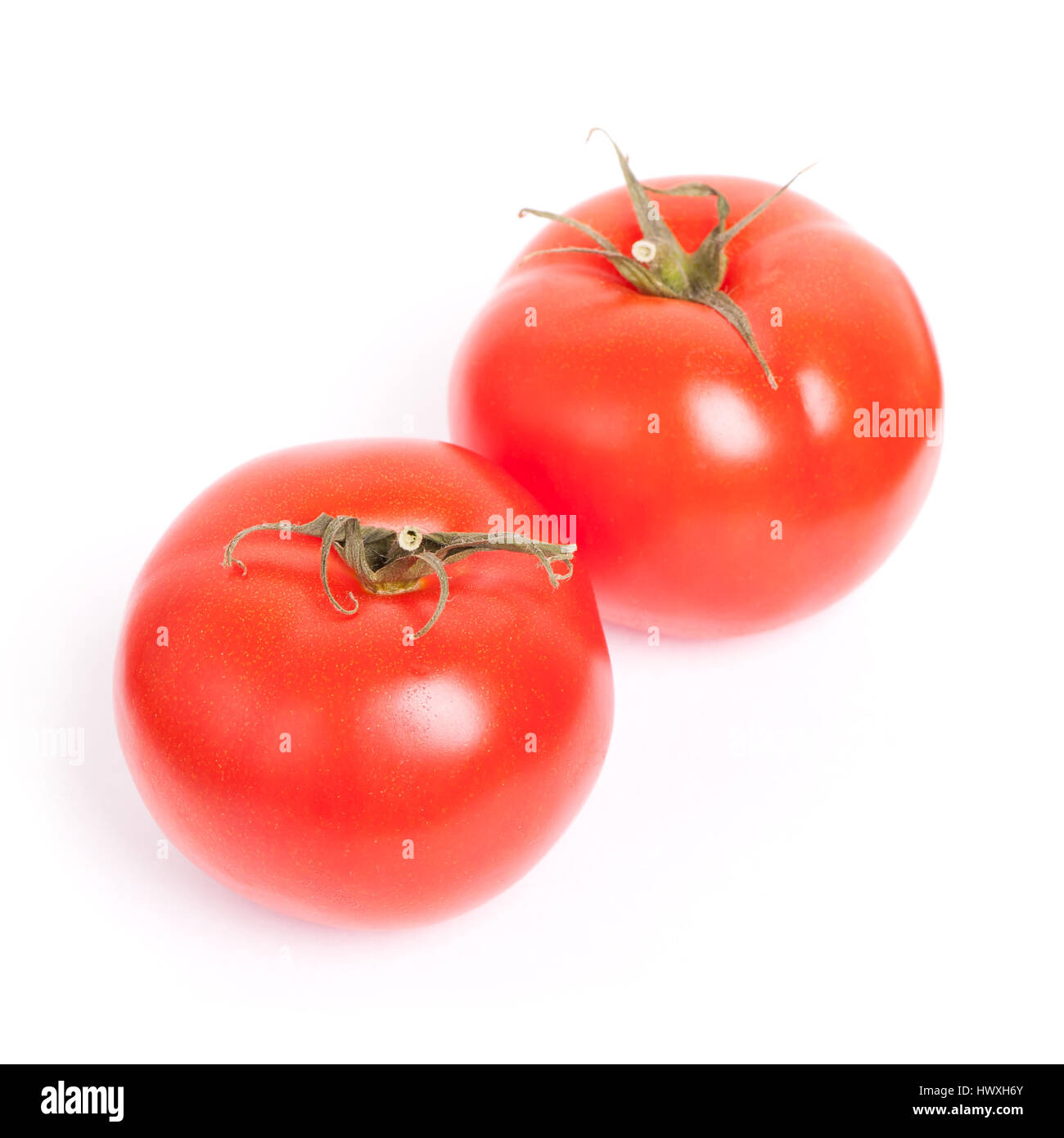 Tomato isolated on white background Stock Photo - Alamy