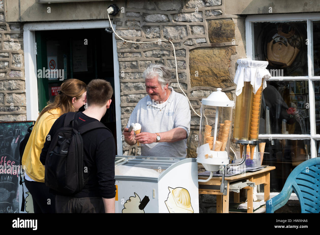 Man serving ice cream in Castelton Derbyshire England Stock Photo Alamy