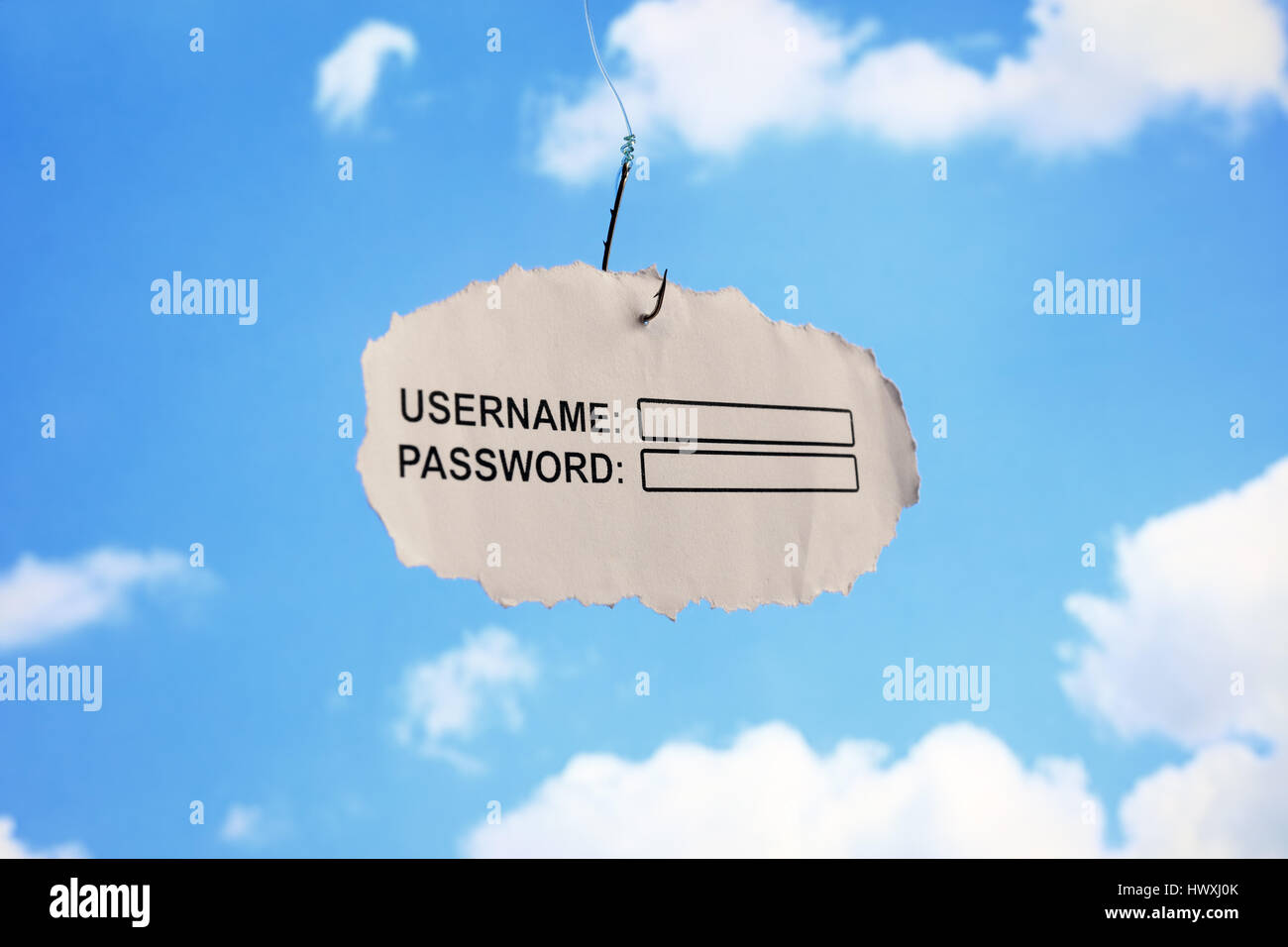 Computer username login and password on paper attached to a hook concept for phishing or internet security Stock Photo