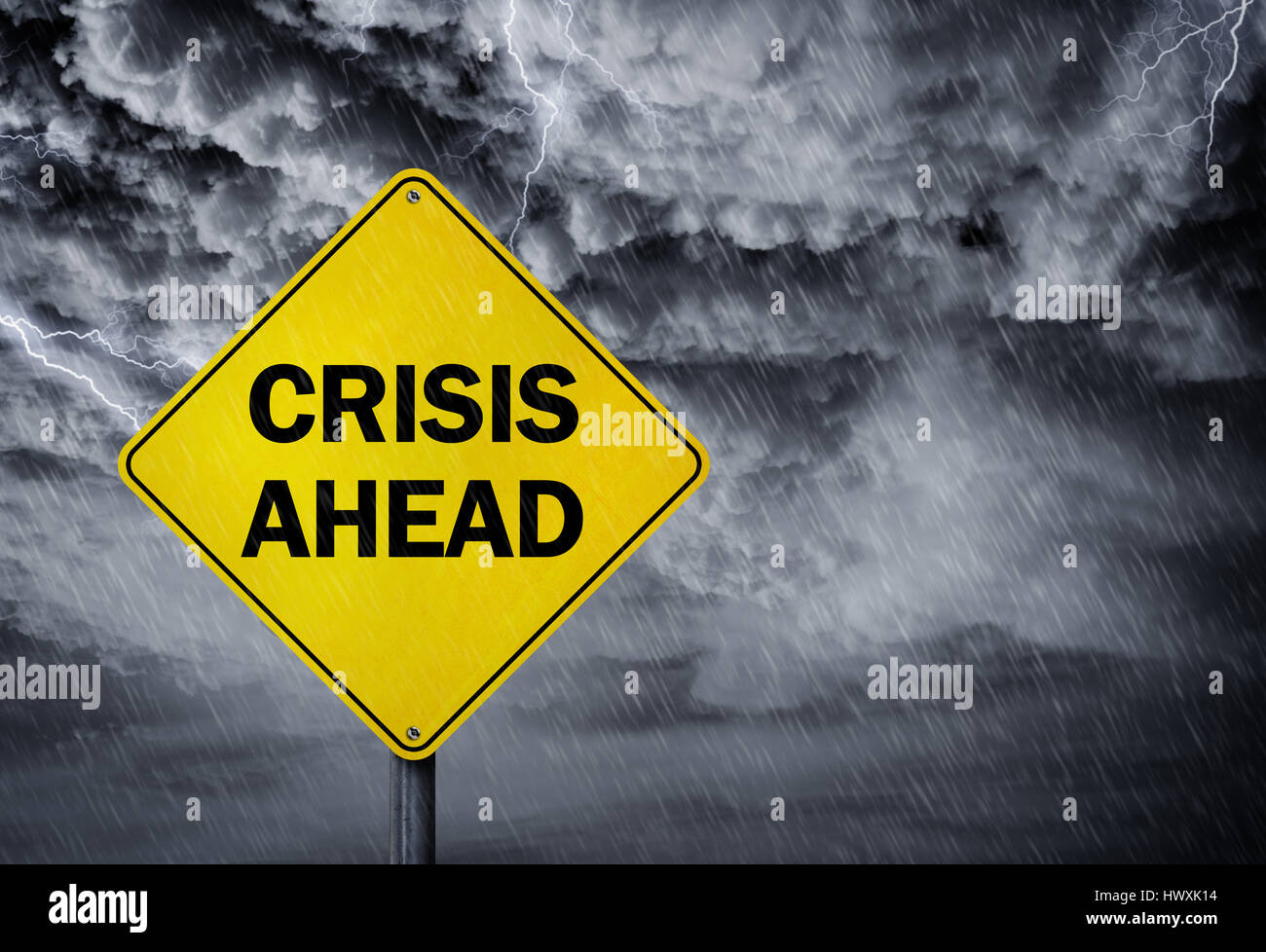Crisis ahead sign in a rain storm concept for financial problems, risk and economic depression Stock Photo
