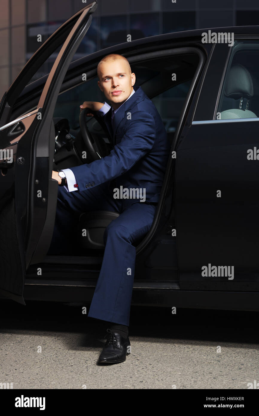Young businessman sitting car hi-res stock photography and images - Alamy