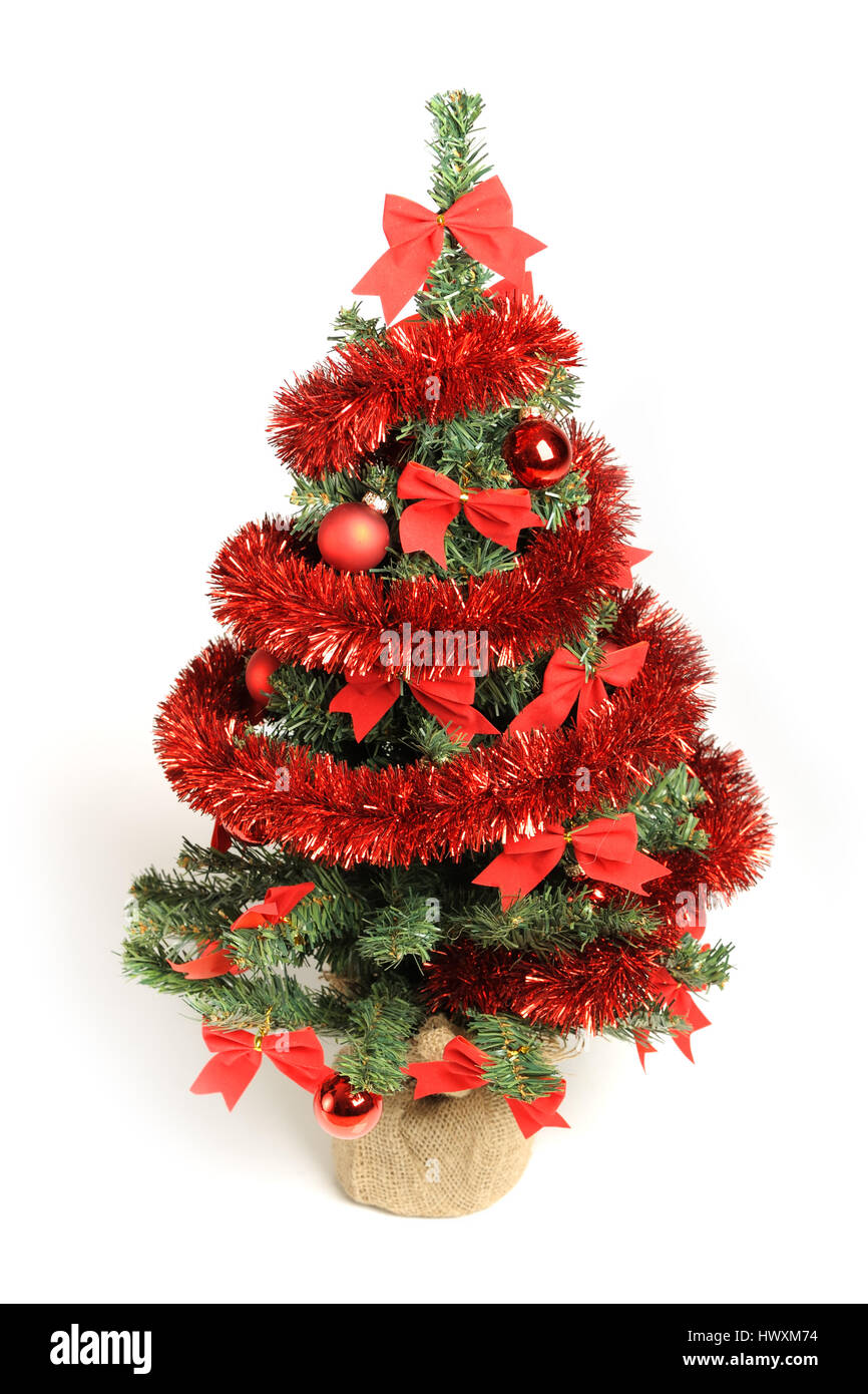 Decorated Christmas tree isolated on white background Stock Photo - Alamy