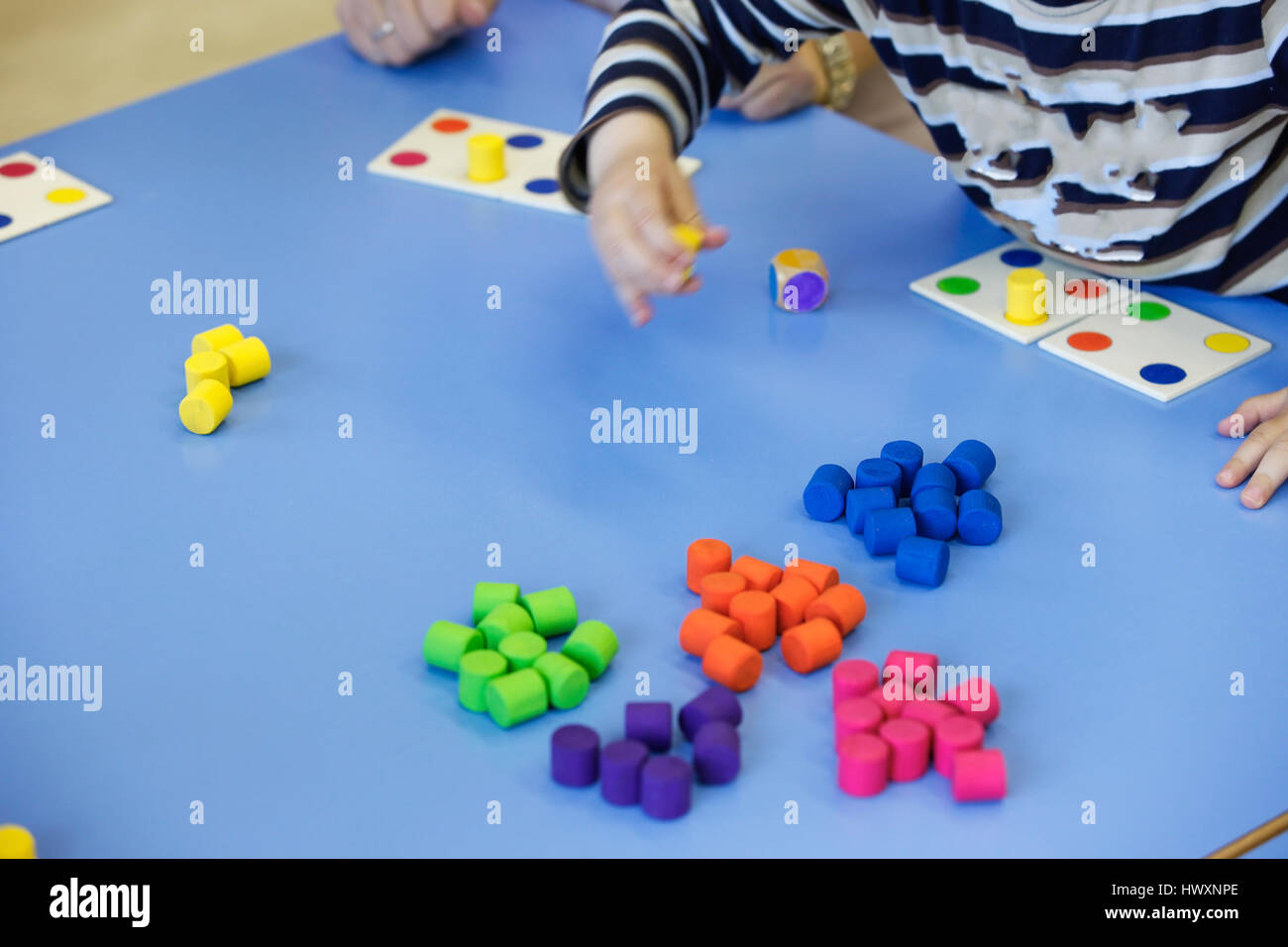 Children playing with homemade, doityourself educational toys