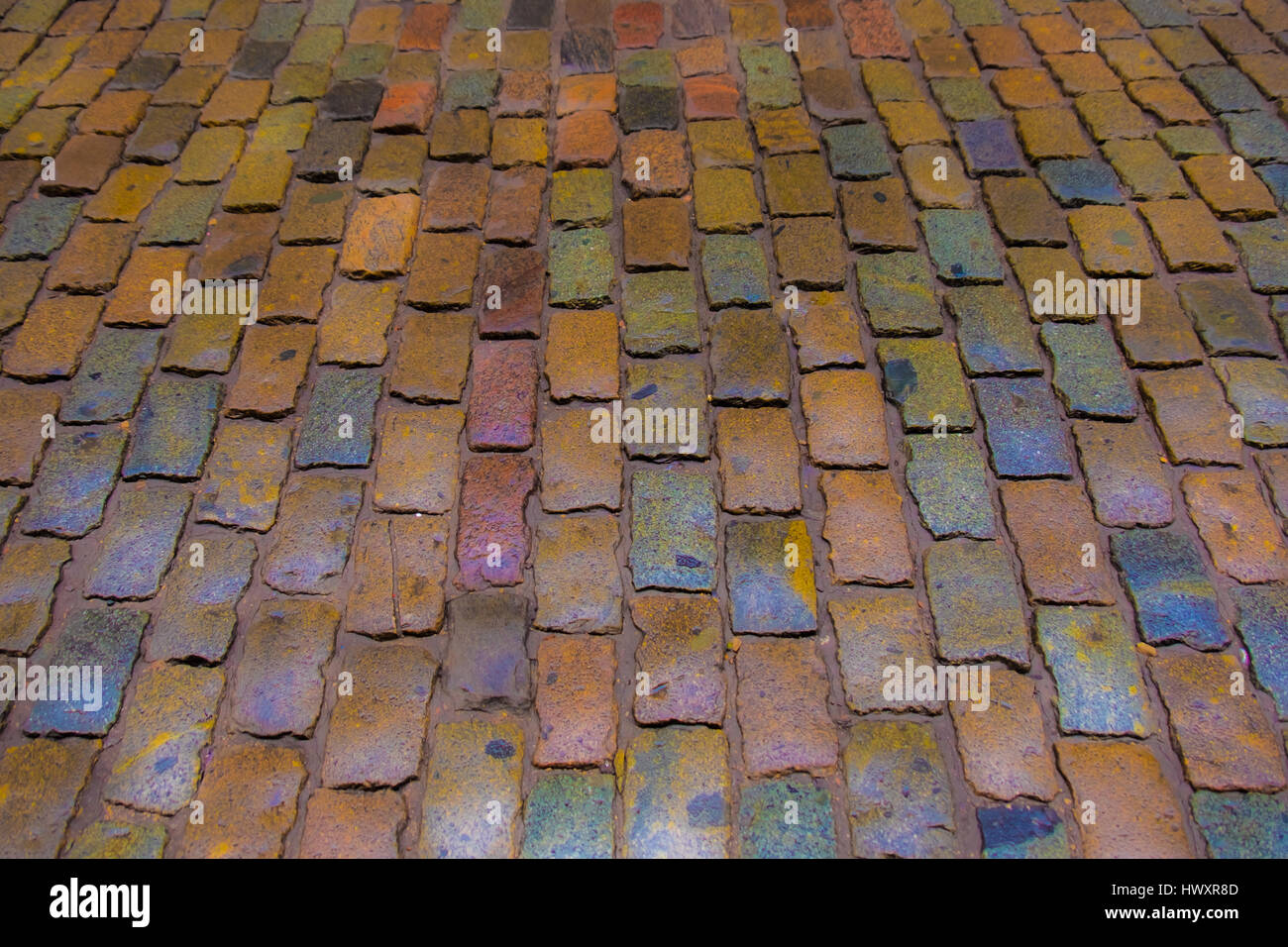 Colorful cobblestone road pavement, background photo  texture Stock Photo