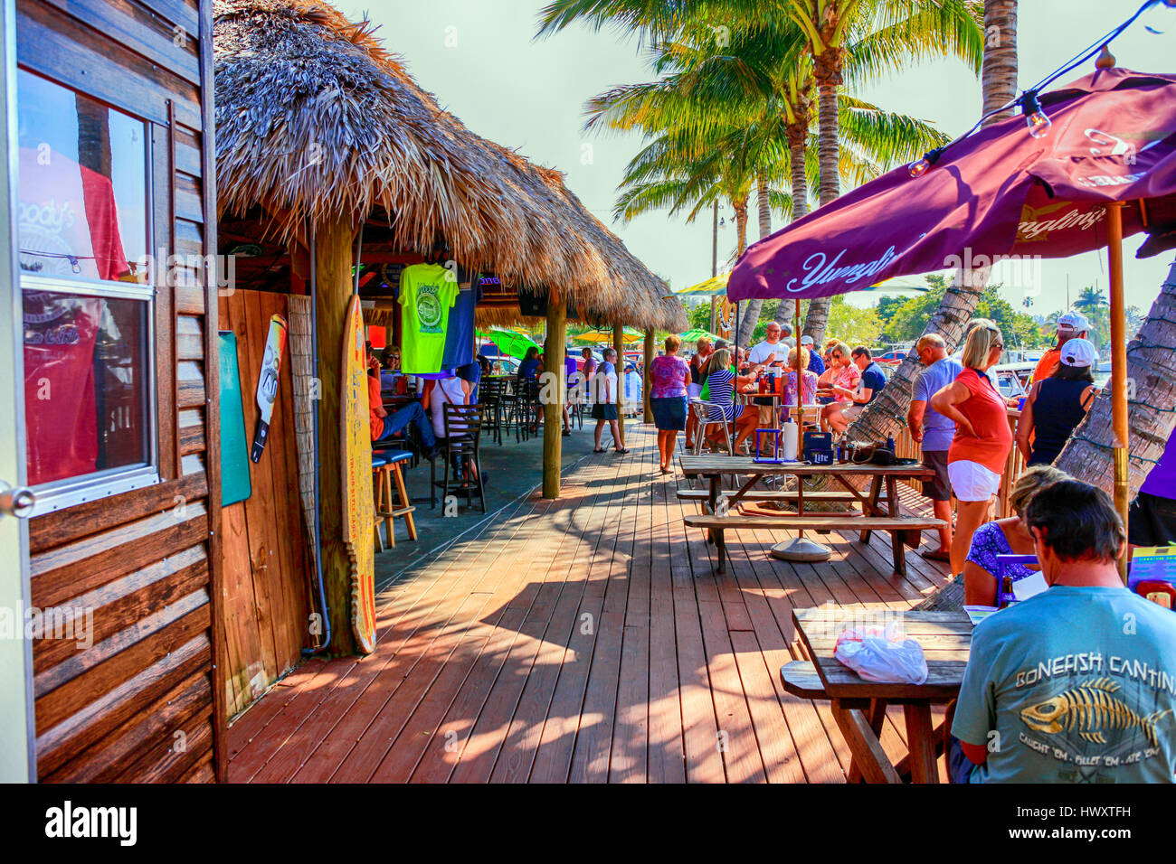 People sitting outside at Woody's People, Diners, waterfront Restaurant