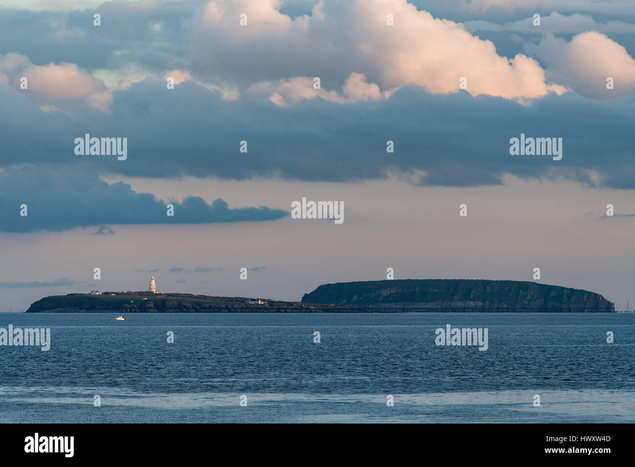A view from the Cardiff Bay barrage towards Flat Holm (left) and Steep Holm (right) islands in the Bristol Channel. Stock Photo