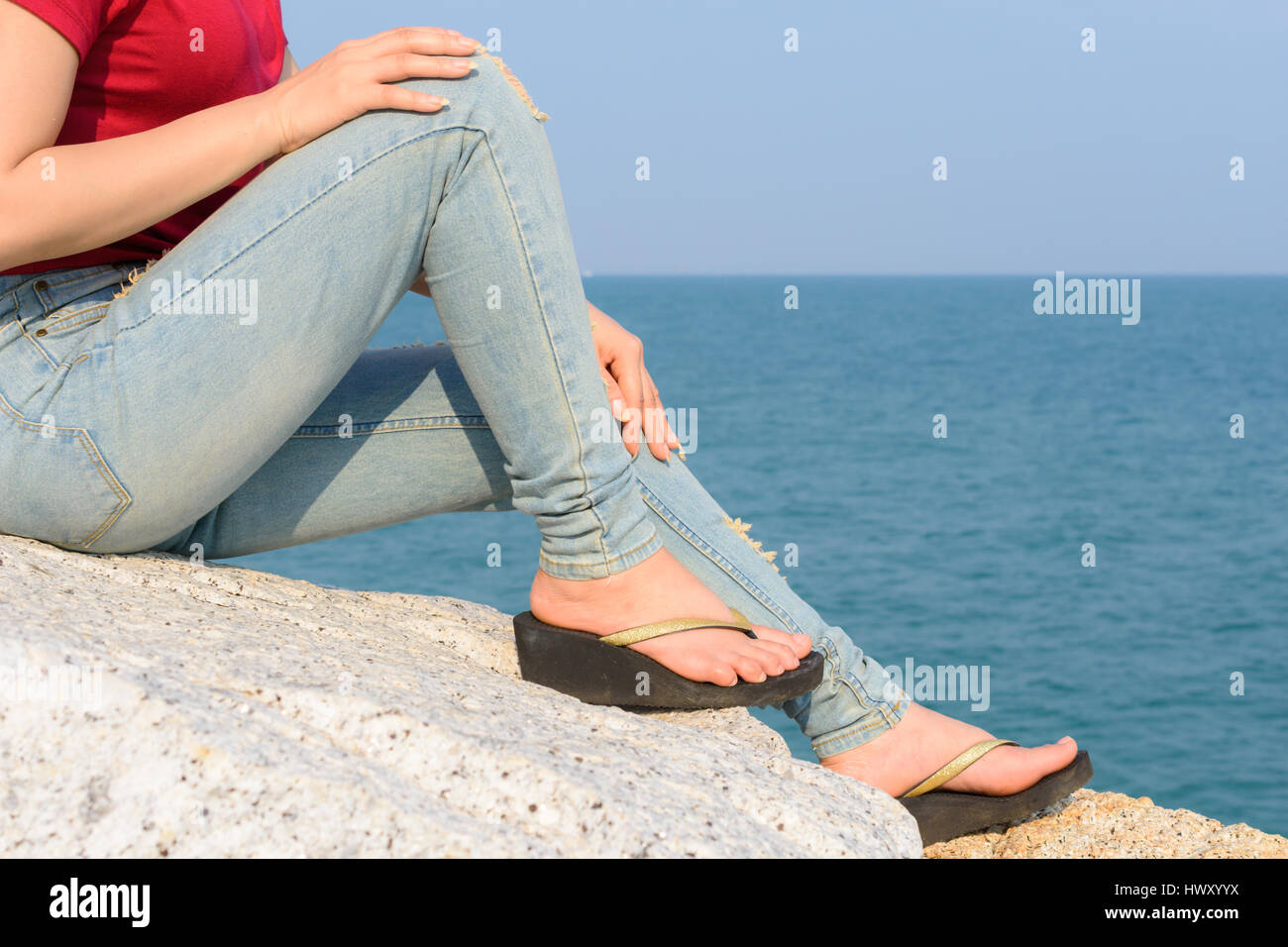 red t shirt with blue jeans