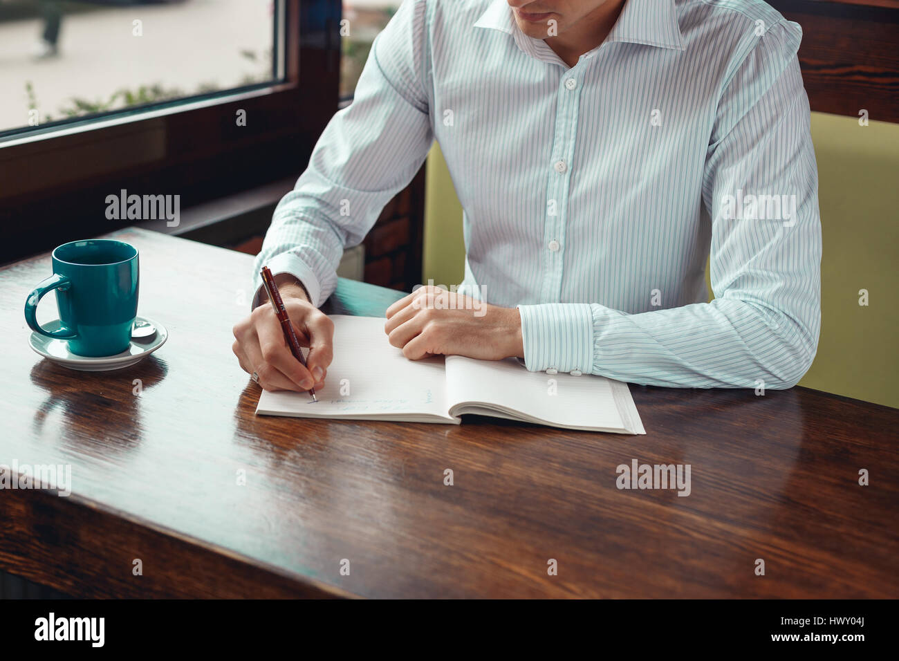Full concentration man with coffee Stock Photo Alamy