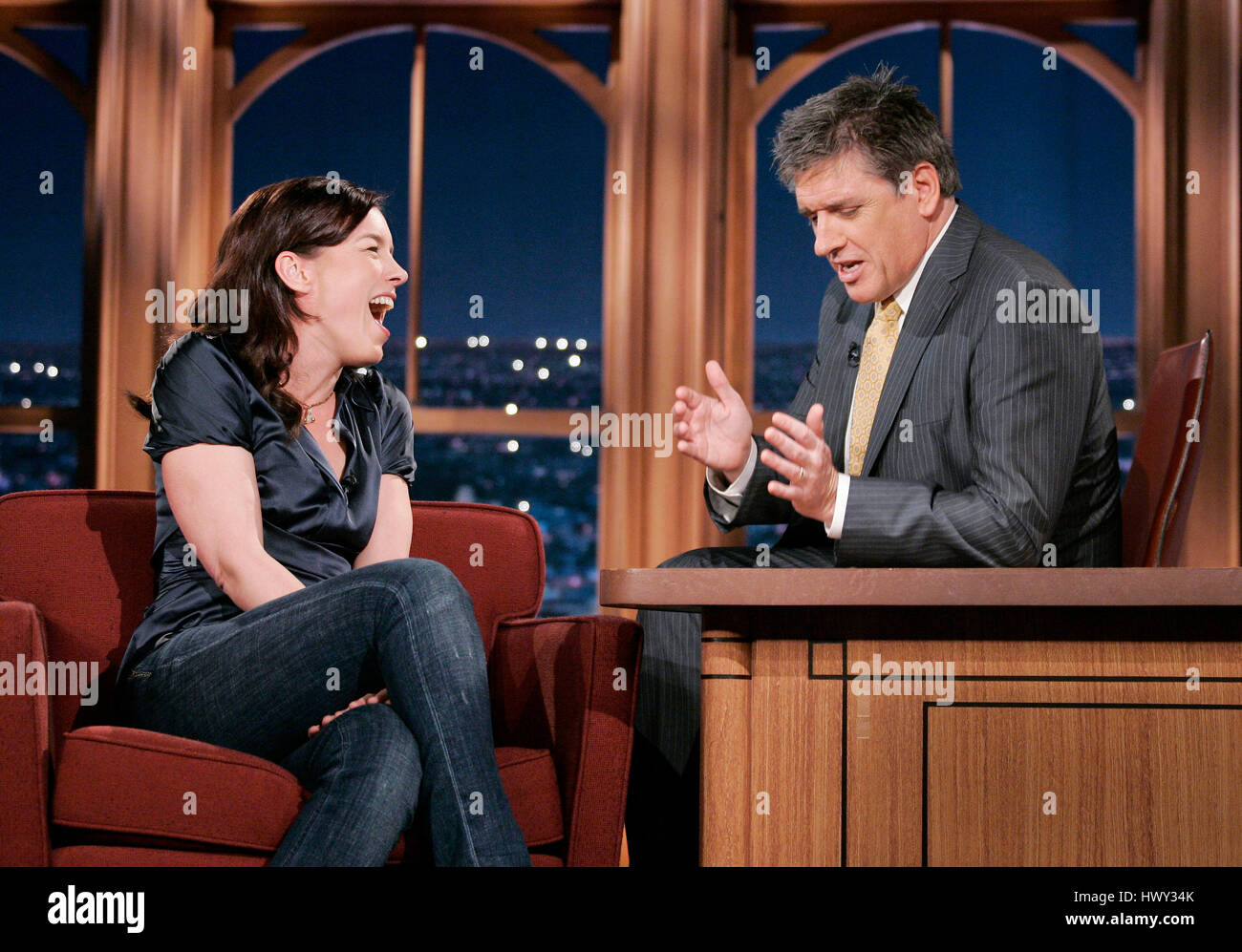 Actress Olivia Williams, left, chats with host Craig Ferguson during a segment of 'The Late Late Show with Craig Ferguson' at CBS Television City in Los Angeles, California, on Jan. 20, 2009. Photo by Francis Specker Stock Photo