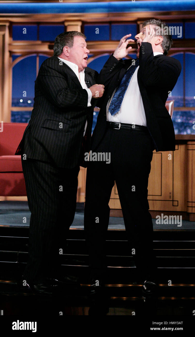 Actor William Shatner, left, shows host Craig Ferguson how he got attacked by a seal in Hawaii during a segment of 'The Late Late Show with Craig Ferguson' at CBS Television City in Los Angeles on Wednesday, Jan. 7, 2009. Photo by Francis Specker Stock Photo
