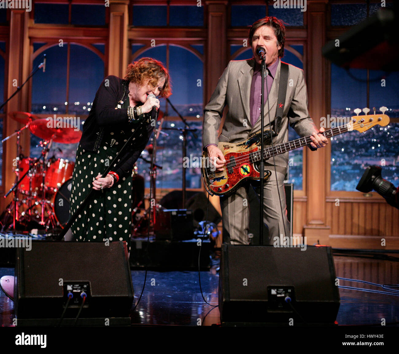 The punk band, 'X', with band members Exene Cervenka, on lead vocals, and John Doe on bass guitar perform during a segment of 'The Late Late Show with Craig Ferguson' at CBS Television City on Oct. 27, 2008 in Los Angeles, California. Photo by Francis Specker Stock Photo
