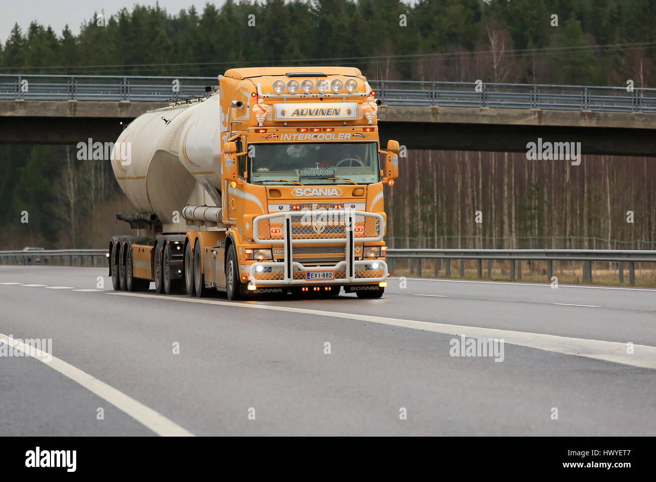 SALO, FINLAND - NOVEMBER 18, 2016: Super tank truck Scania R164 of Kuljetus Auvinen Oy motorway in Salo on a rainy afternoon. Stock Photo