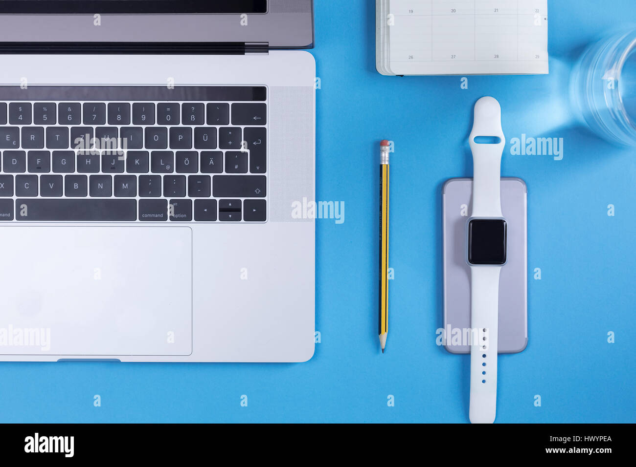 Various electronic devices, personal organizer, pencil and glass of