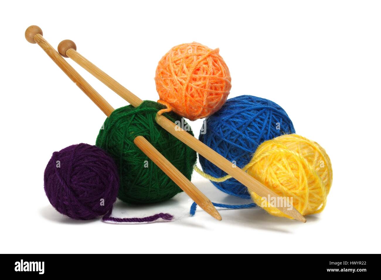 Knitting wool and needles on white background Stock Photo - Alamy