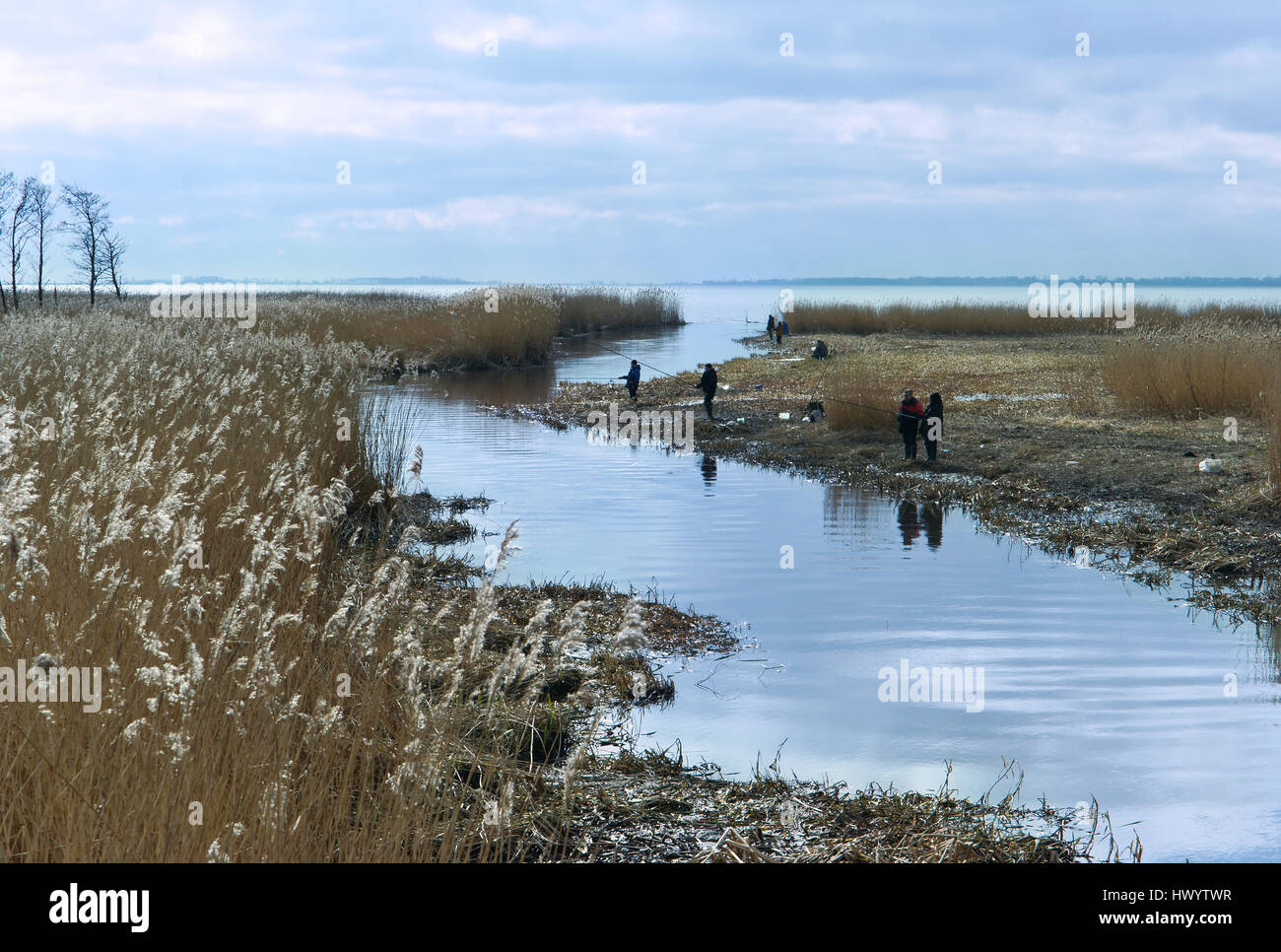 fishermen resting by the river, fishing is their hobby Stock Photo