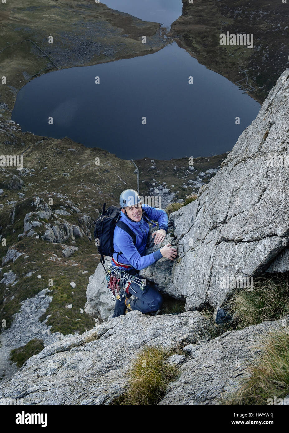 UK, North Wales, Snowdonia, Craig Cwm Silyn, mountaineer on Outside Edge Route Stock Photo