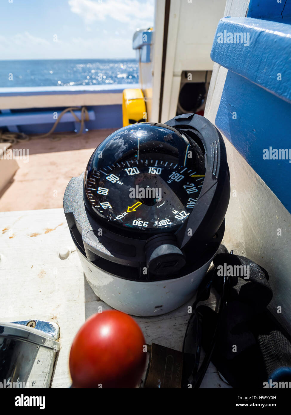 Compass on a sailing ship Stock Photo