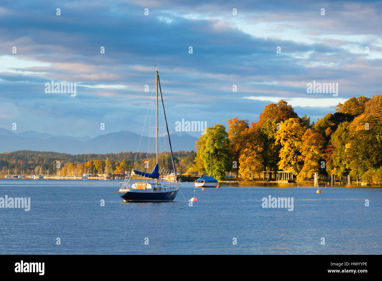 Germany, Bavaria, sailing ship on Lake Starnberg in the morning Stock Photo