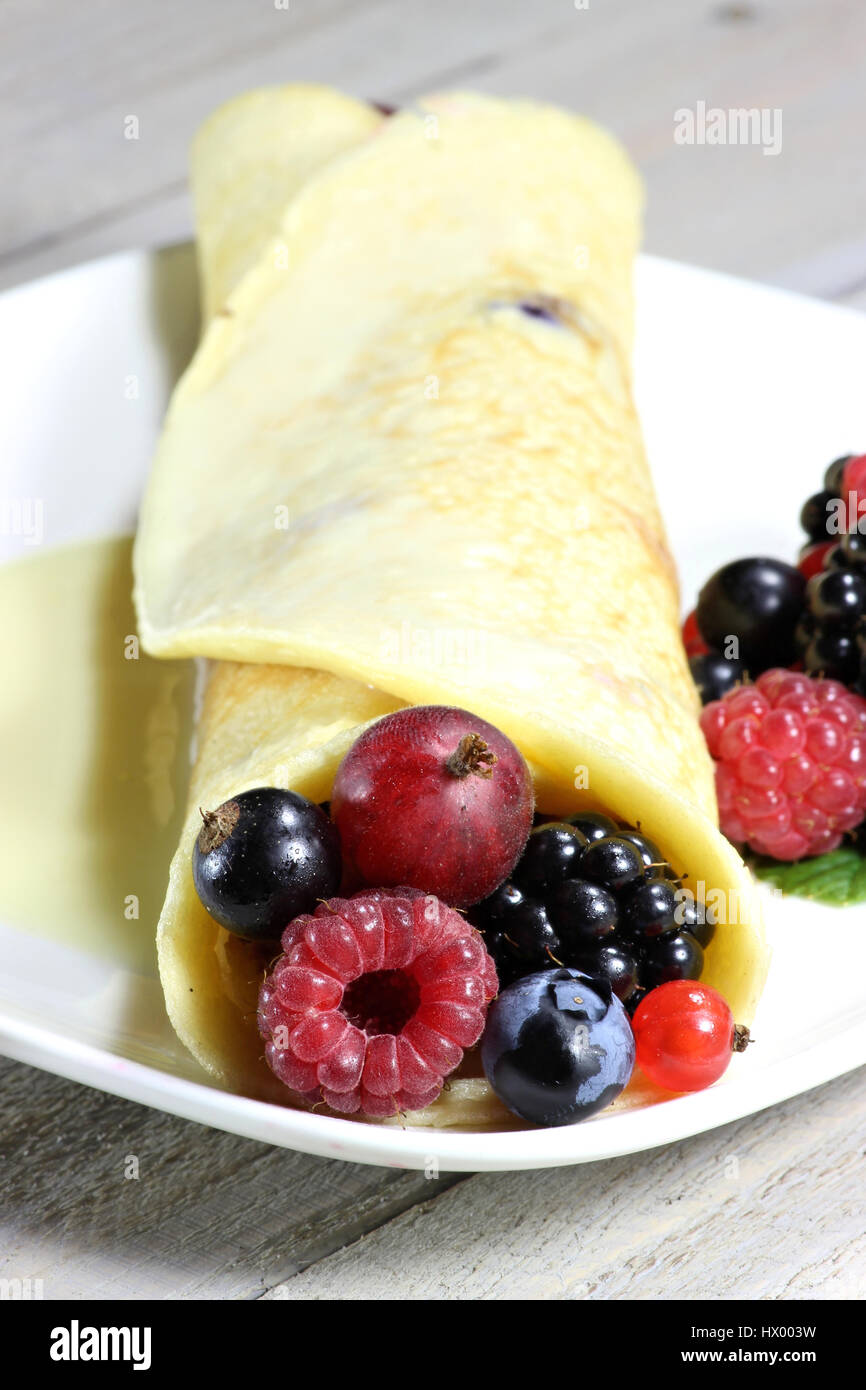 pancake with garden berries and custard sauce Stock Photo Alamy