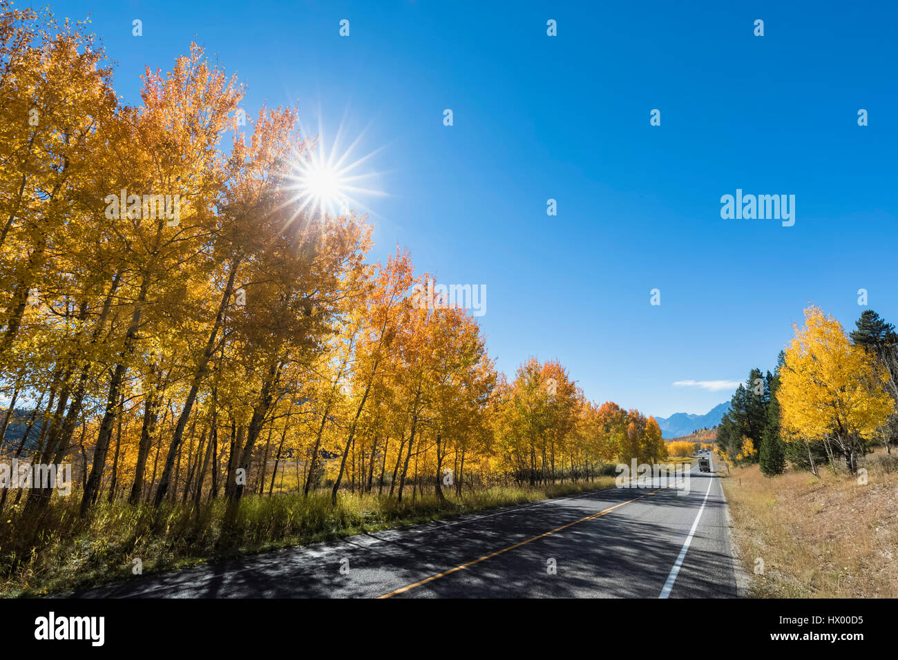 USA, Wyoming, Rocky Mountains, Grand Teton National Park, John D. Rockefeller Jr. Parkway with aspens in autumn Stock Photo