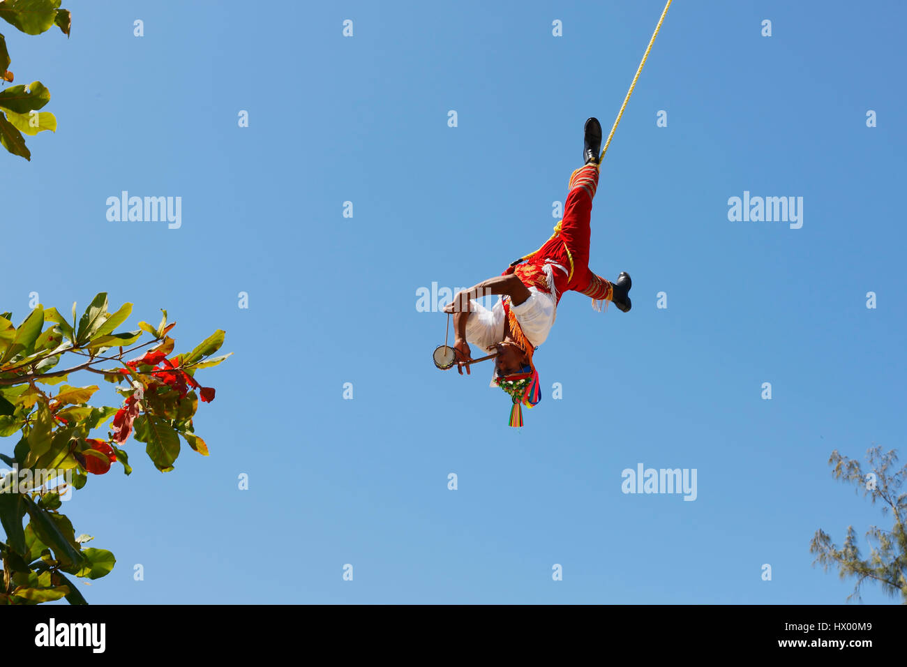 Papantla Flying Men Flying man in Tulum, Mexico Stock Photo