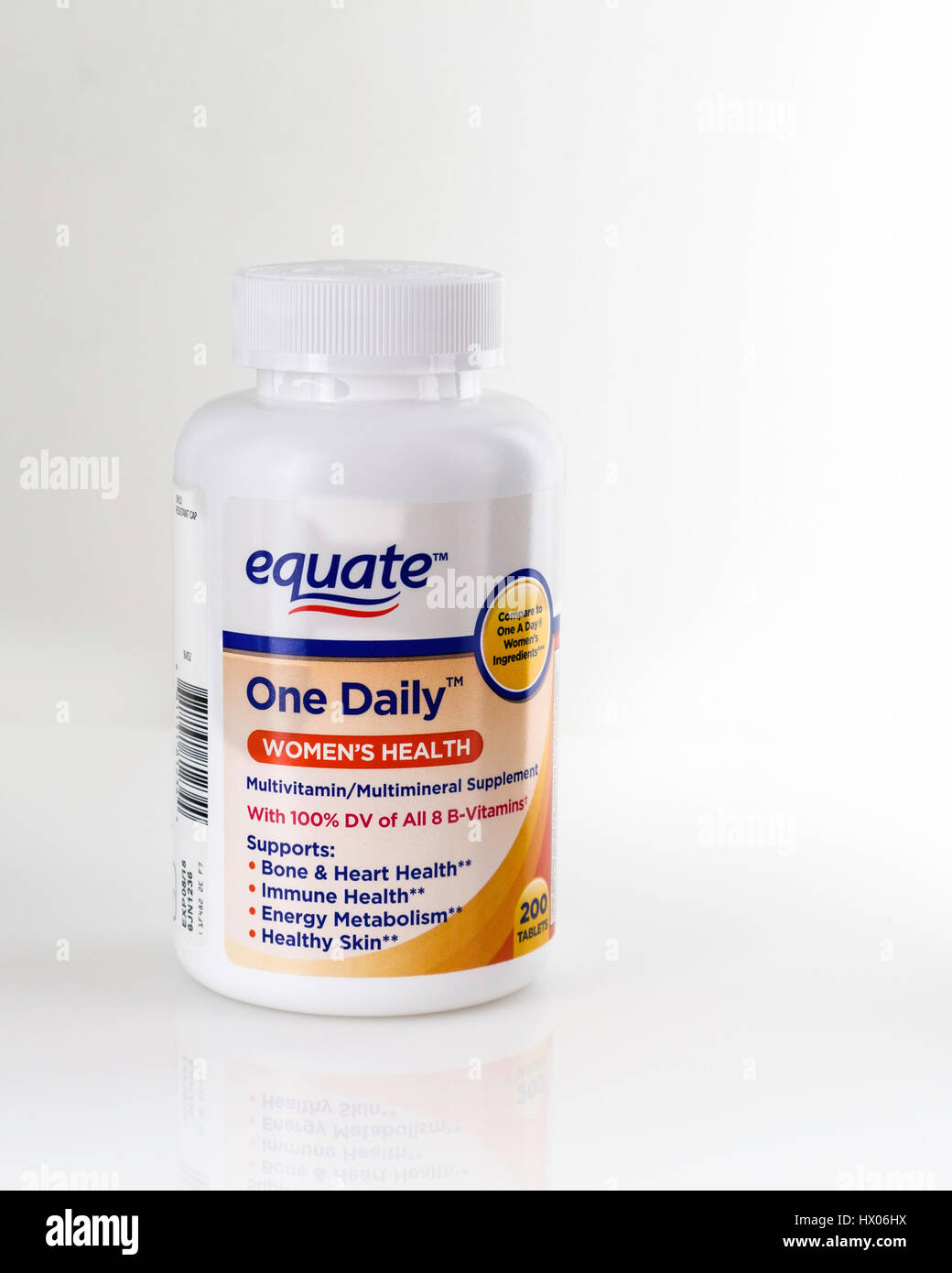 A plastic bottle of equate brand One Daily Women's Health multivitamins, multimineral tablets on a white background. Cutout, USA. Stock Photo