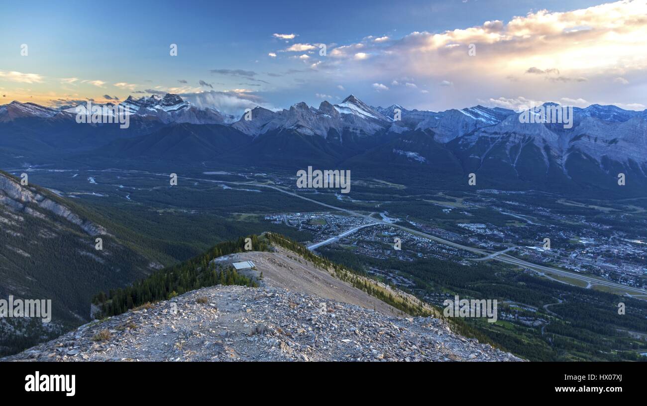 Panoramic Aerial Scenic view of Canmore in Bow Valley and distant Canadian  Rocky Mountain Peaks on Skyline from Summit of Mount Lady MacDonald Stock  Photo - Alamy