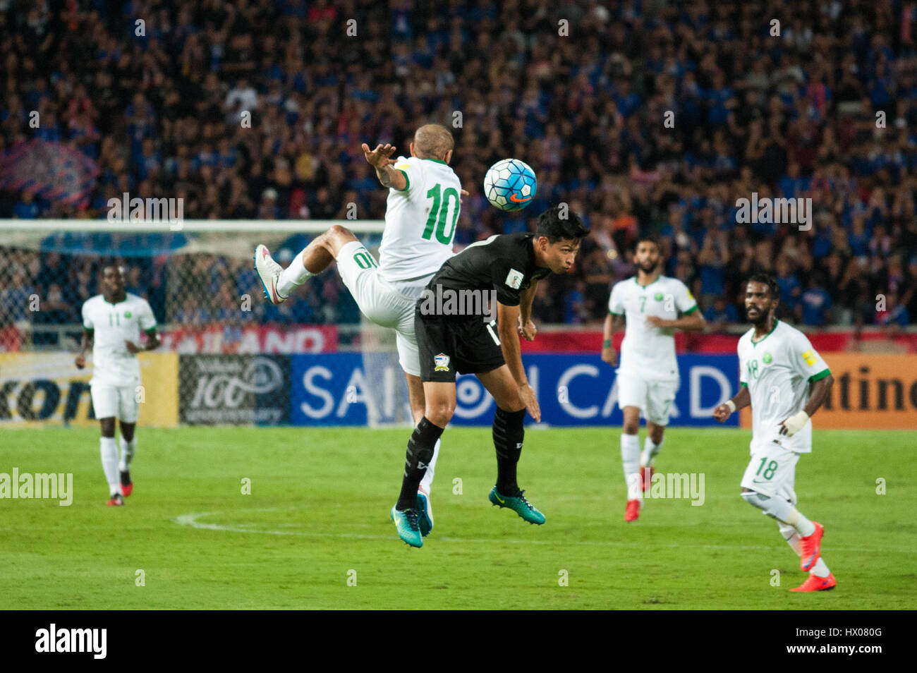 Bangkok, Thailand. 23rd Mar, 2017. 23 March, 2017. Tanaboon Kesarat (R) from Thailand vie for the ball during Mohammad Al-Sahlawi (L) of Saudi Arabia during 2018 FIFA World Cup Qualifier Group B match between Thailand and Saudi Arabia at the Rajamangala National Stadium in Bangkok, Thailand. Credit: Anusak Laowilas/Pacific Press/Alamy Live News Stock Photo