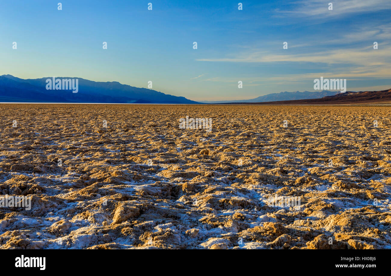 This is a view of the crystalized salt layer in the Badwater Basin area of Death Valley National Park, California, USA. Stock Photo