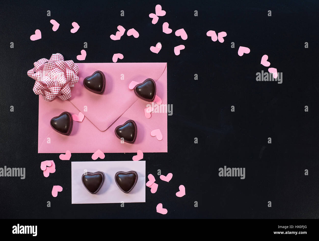 Lots of hearts on black background Stock Photo