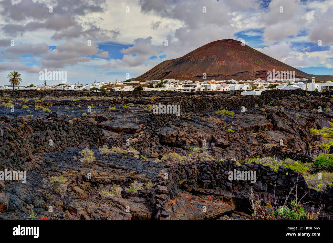 view on the typical Landscape and the La Woerden Volcano near Tahiche, Lanzarote, Spain Stock Photo