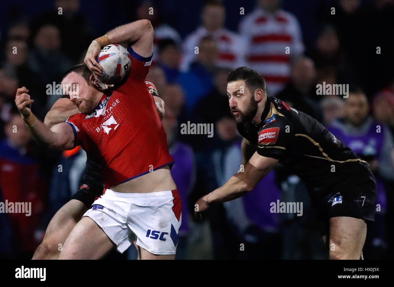 Wakefield's Danny Kirmond is tackled by Leigh Centurions' Lachlan Burr during the Betfred Super League match at Belle Vue, Wakefield. Stock Photo