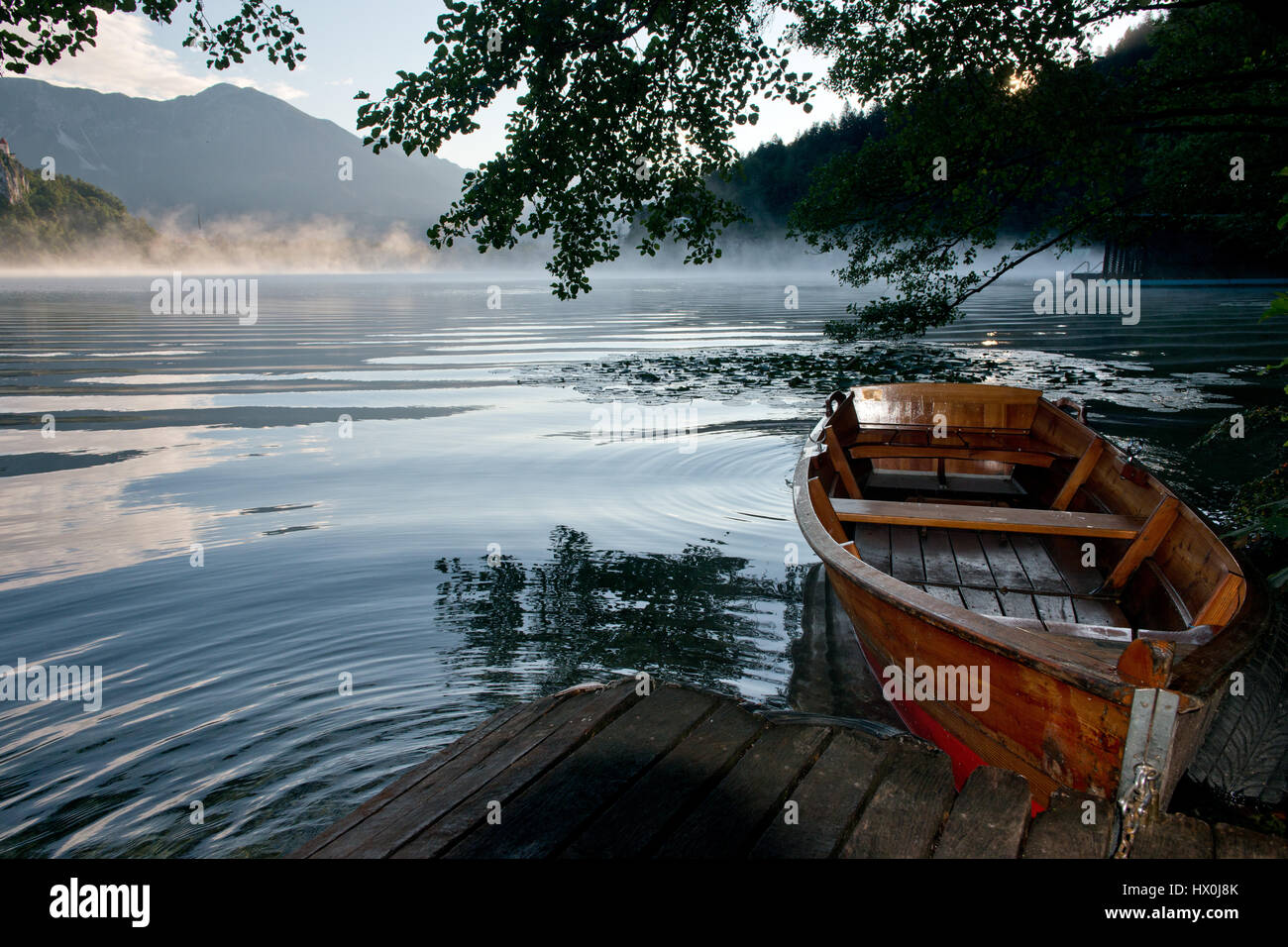 Boat at the pier on the Bled Lake, one the turistical symbols of Slovenia. Stock Photo