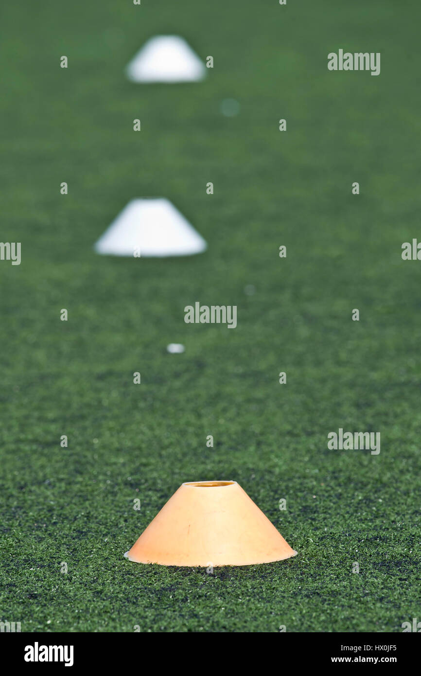 Yellow cone on a soccer field for training Stock Photo Alamy