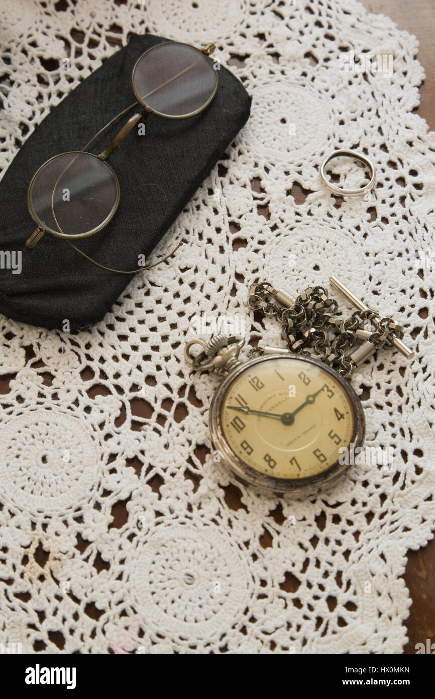 Antique reading glasses and pocket watch Stock Photo Alamy