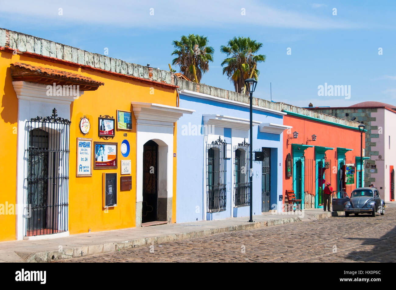 Road with colorful colonial houses, center, Oaxaca, Mexico Stock Photo