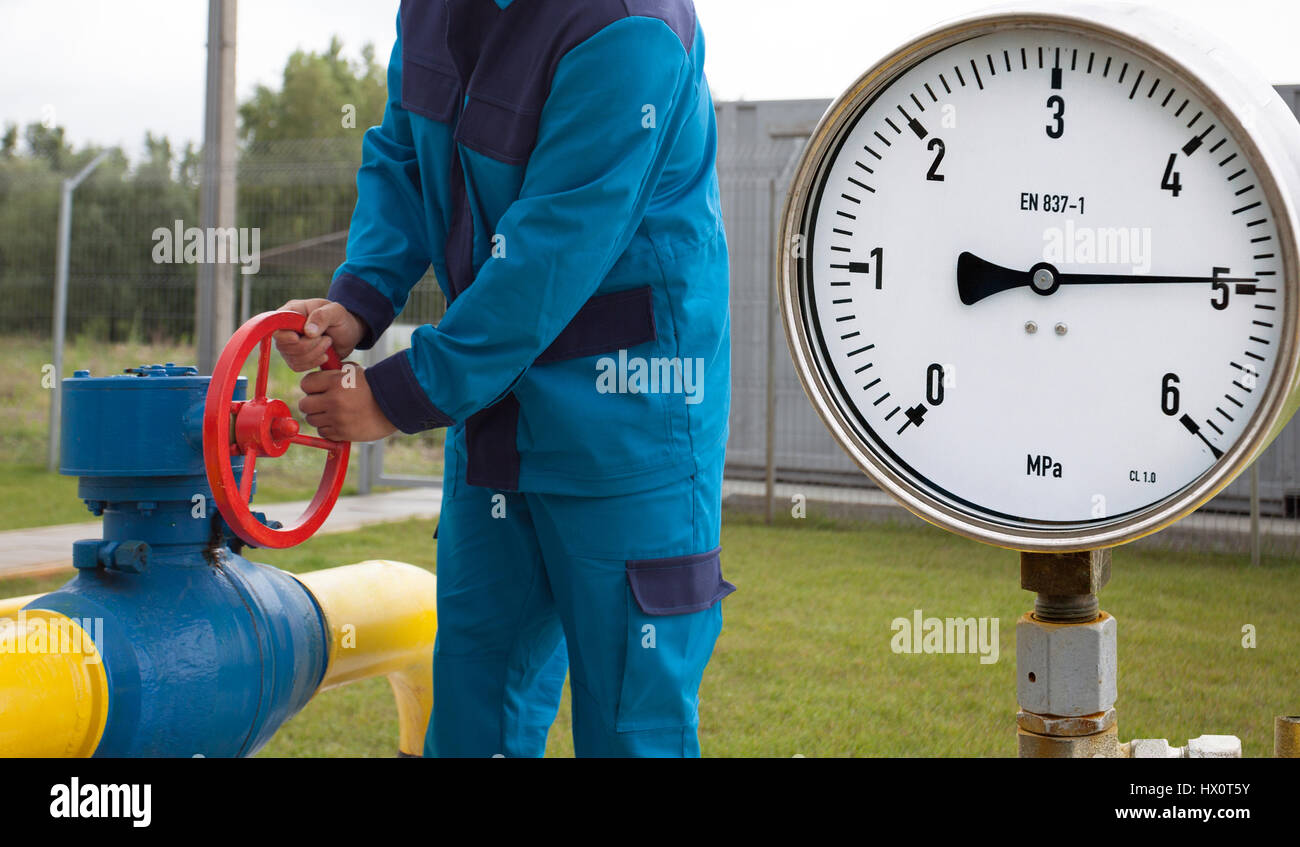 Gas manometer on background Valves manual in the production process