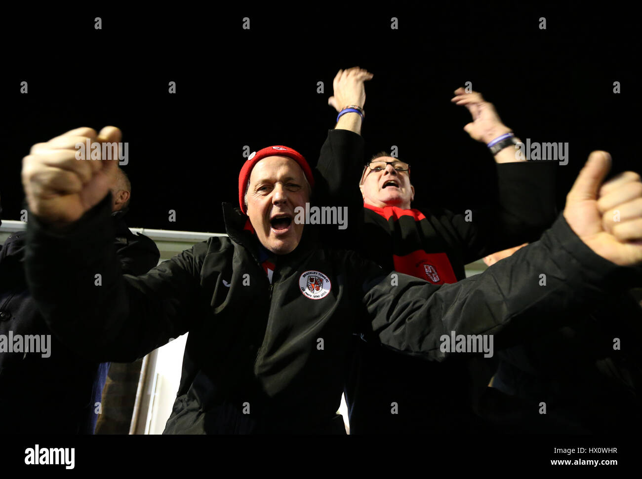 Brackley Town cheer on their team during the FA Cup First Round Replay at St James Park, Brackley Stock Photo