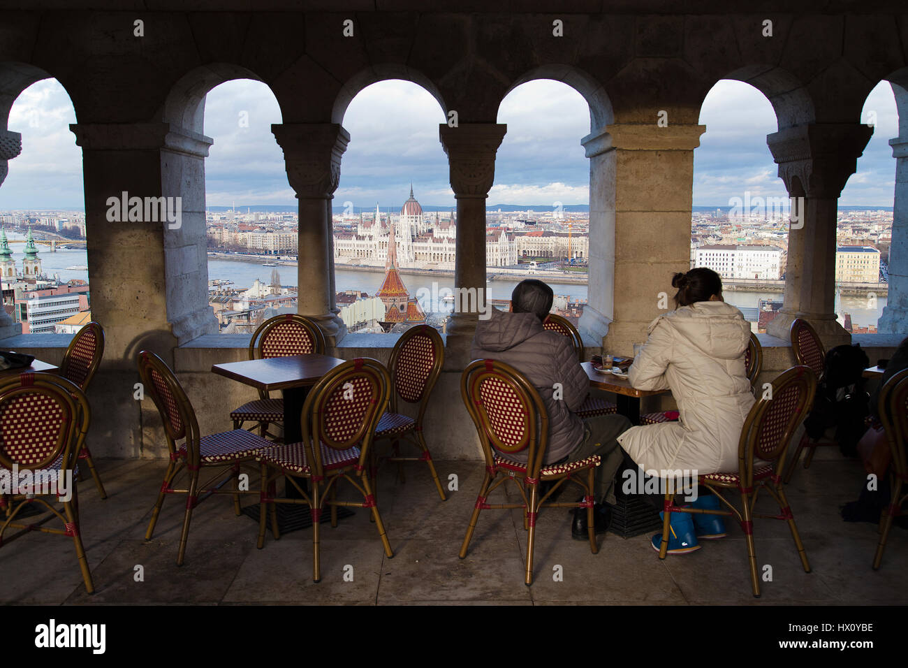 View of the Hungarian Parliament Building from the Panorama cafe in Trinity Square in Budapest Hungary Stock Photo