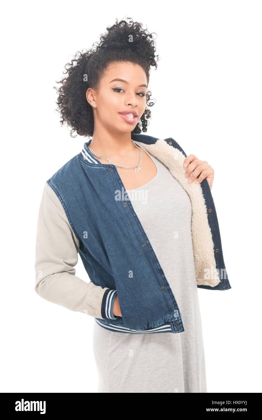 Teenage model with urban fashion clothes isolated on a white background