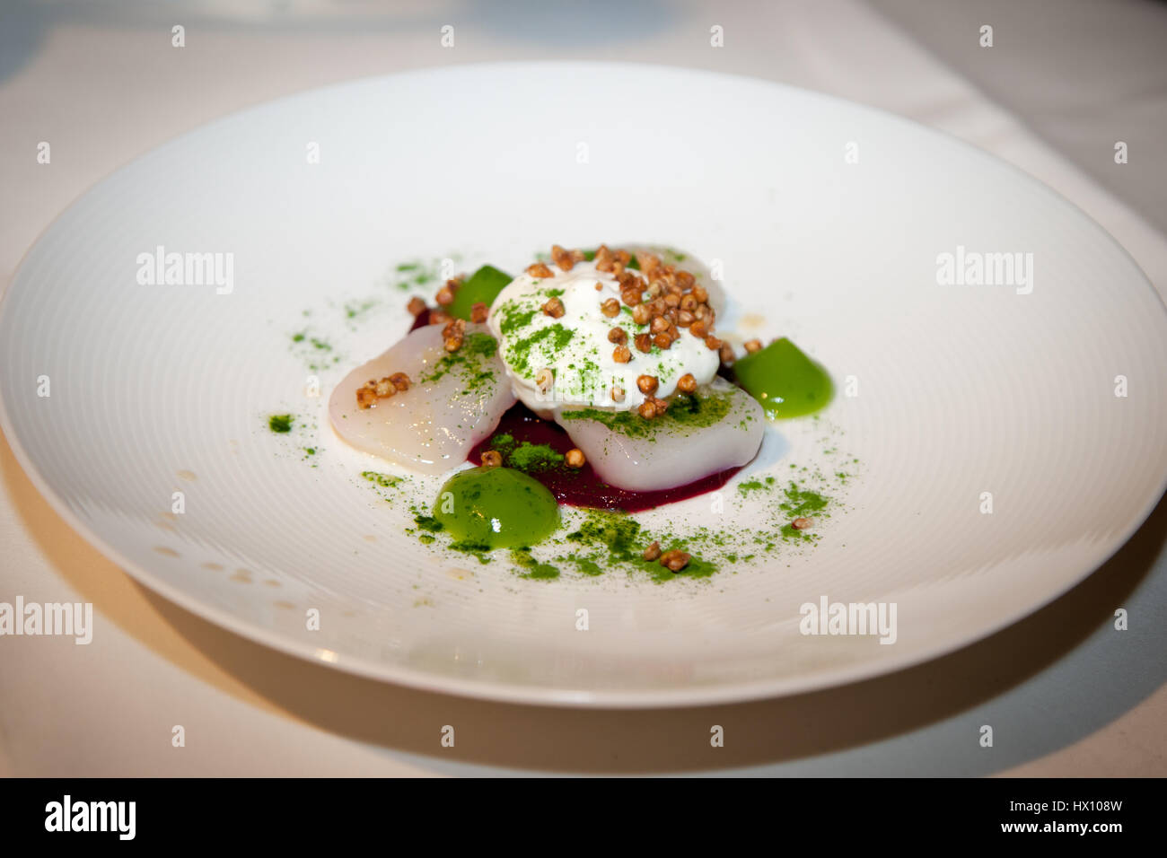 Scallops by Michelin star chef Tom Wickboldt Stock Photo