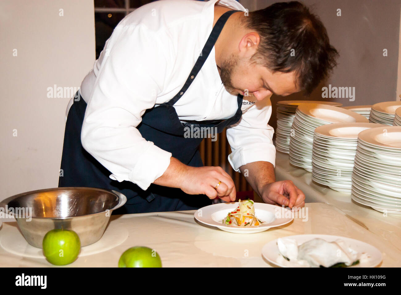 Michelin star chef Anton Schmaus preparing a dish Stock Photo
