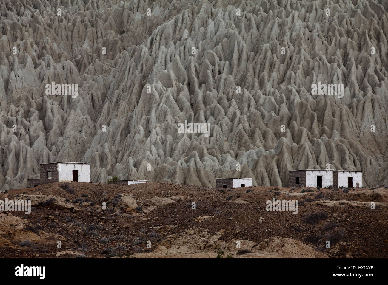 Small village houses in typical geography of Balochistan, Pakistan Stock Photo