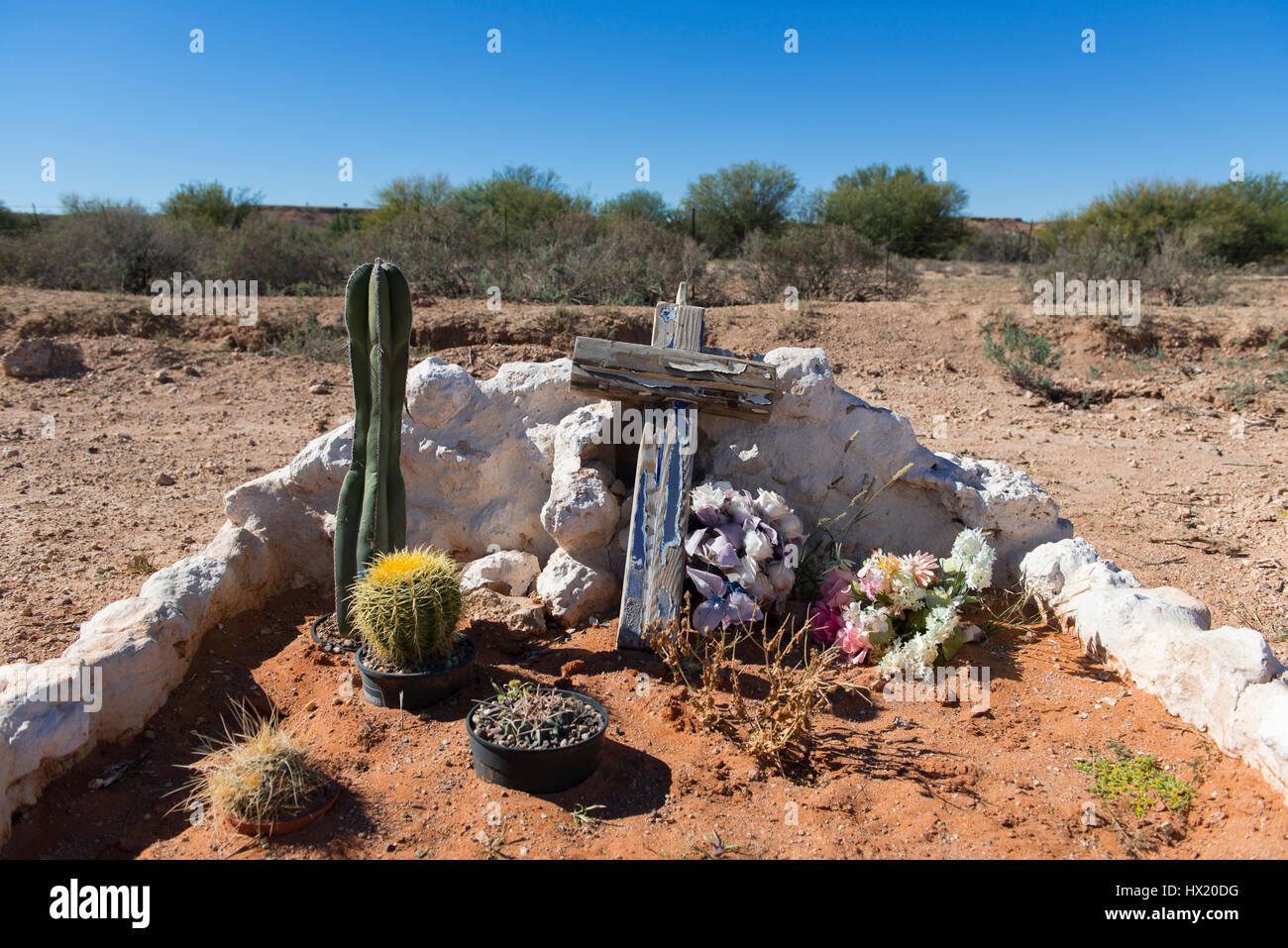 Grave of a traffic casualty on gravel road C 15 in  the Kalahari desert, Namibia Stock Photo