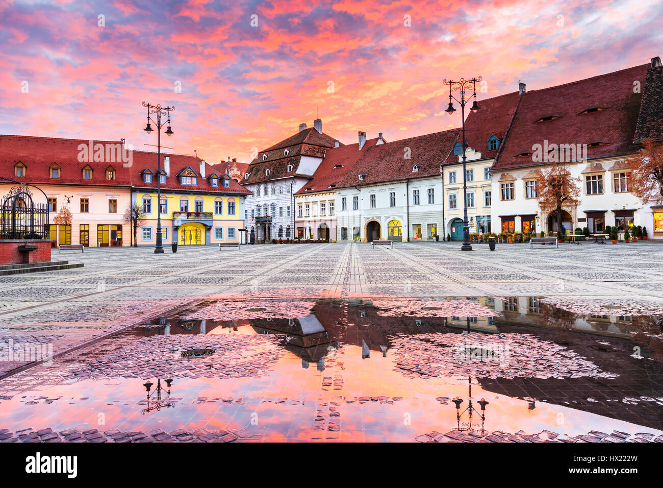 Sibiu, Romania. Large Square (Piata Mare) at sunrise. Transylvanian medieval city. Stock Photo
