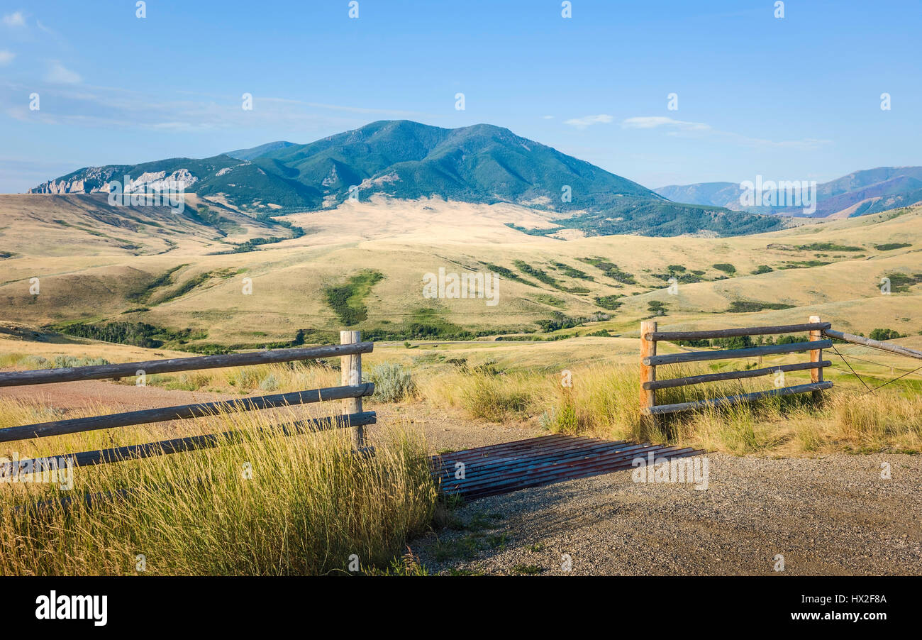 Foothills of Bear Tooth Mountains on a summer day with sagebrush and grassland as viewed from the Bear Tooth Mountain pass highway, Red Lodge, USA. Stock Photo