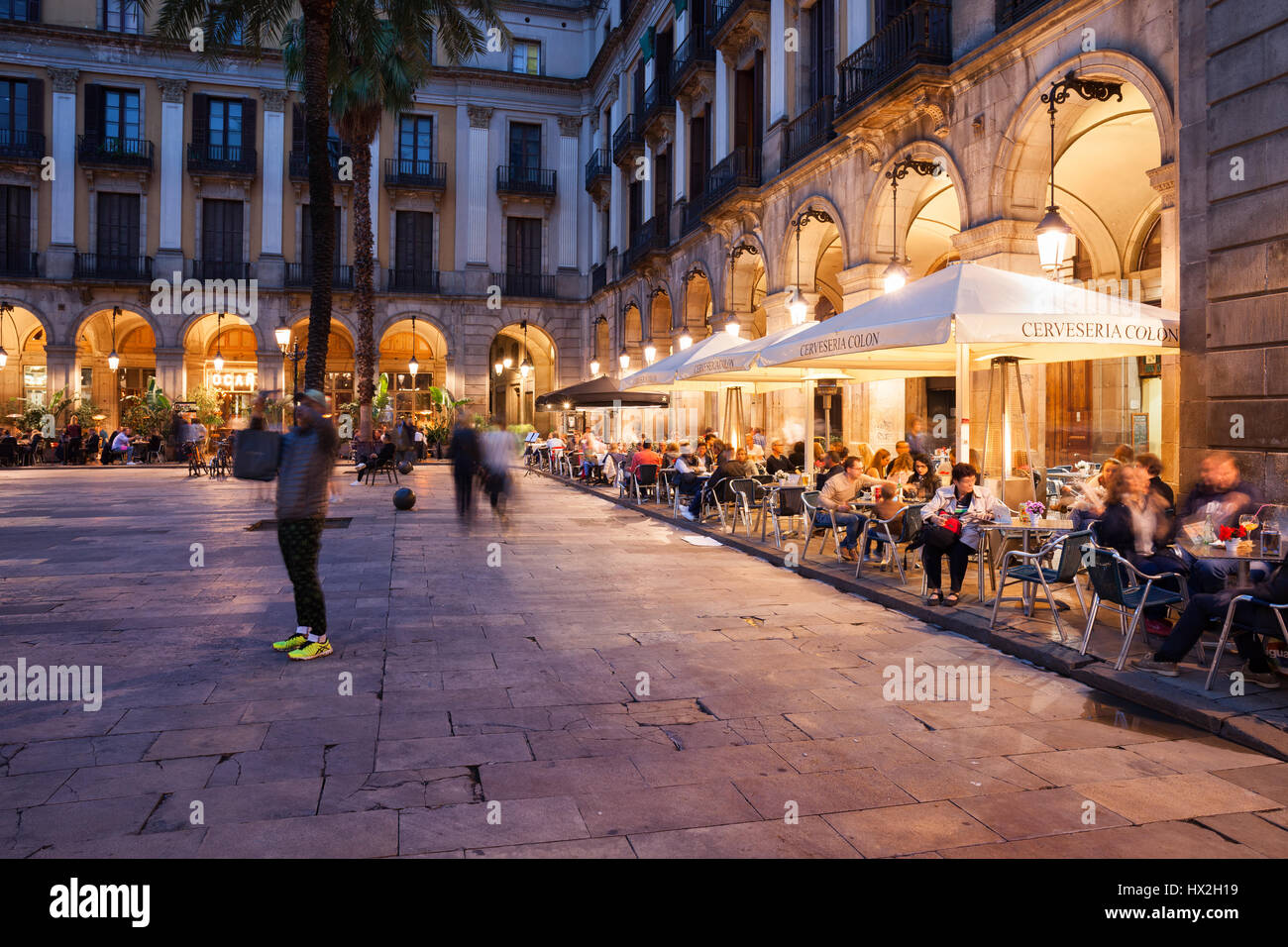 Placa Reial in Barcelona at night with restaurants, cafes, Royal Square in historic city centre, Barri Gotic quarter, Catalonia, Spain Stock Photo